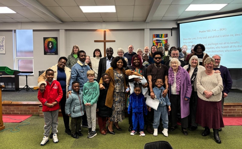 Congregation of New Baptist Church, Burton on Trent, around 30 people including children