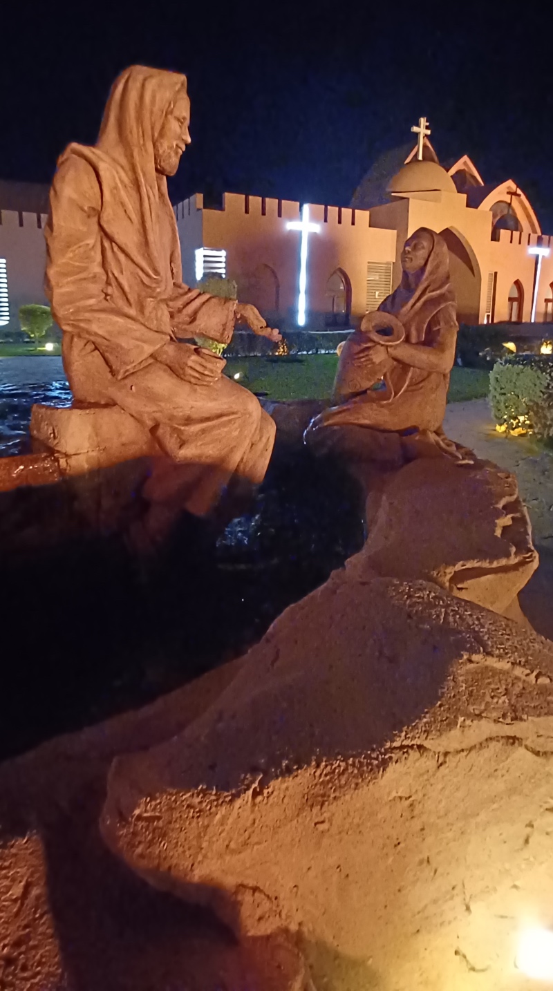 Anafura Centre, with statues depicting Jesus speaking to the woman at the well
